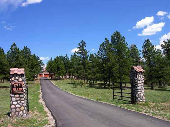 Paved Driveway with entrance gates..........