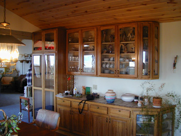 The glass fronted China Cabinets are made of solid Hickory......