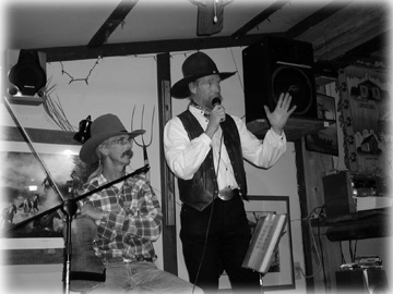 Real Cowboys play and sing at the nearby Oak Creek Grade General Store.........
